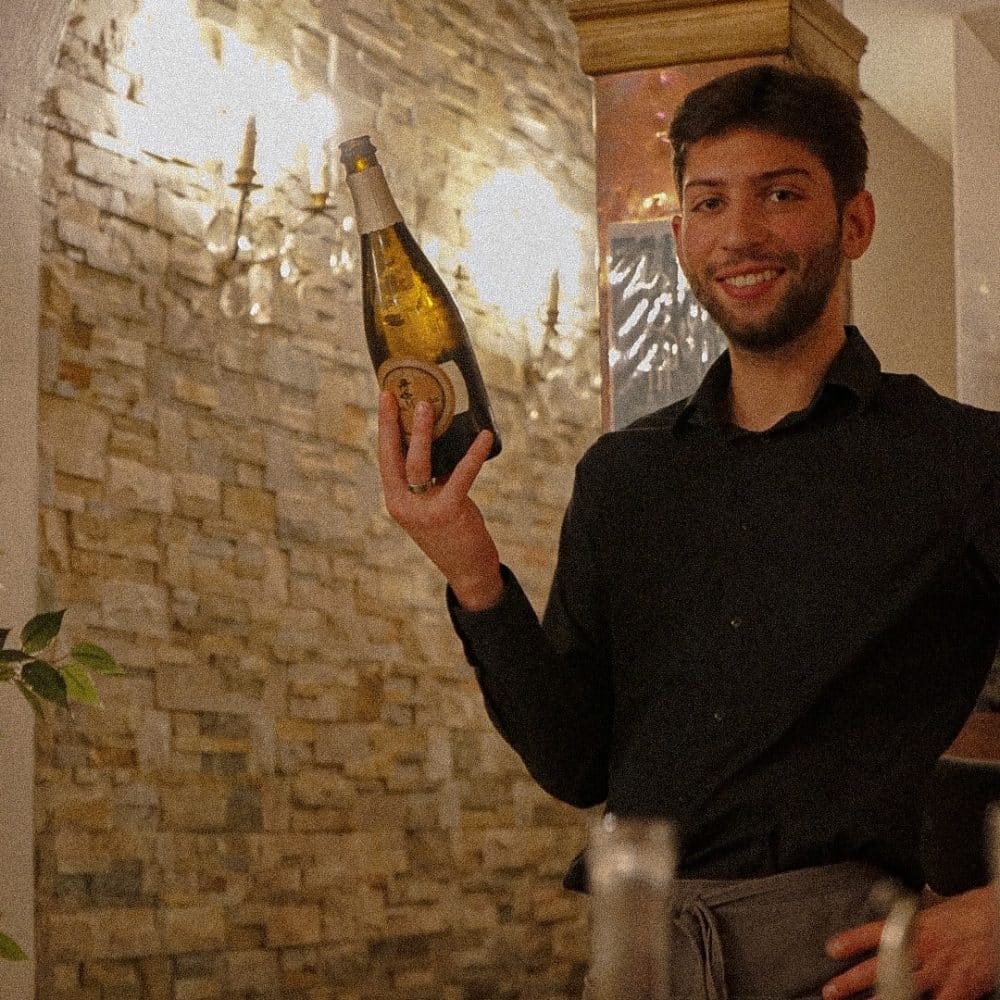 tjener, champagnemiddag hos restaurant Mercante